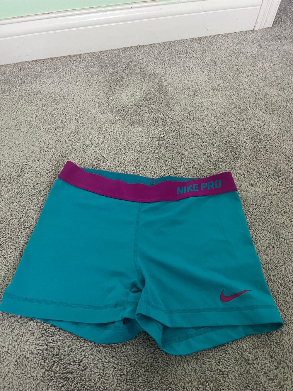Nike Teal Athletic Shorts with Purple Waistband women size medium, juniors
